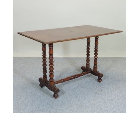 A Victorian mahogany centre table, on bobbin turned legs, 107cm