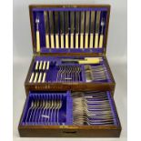 OAK CANTEEN OF WILLIAM RODGERS CUTLERY fitted lidded case with lower drawer, seventy-five items,