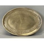 GEORGE III SILVER OVAL CARD TRAY with chased border, raised on four feet, London 1800, 16 x 12cms,