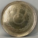 CIRCULAR SILVER CARD TRAY with beadwork rim, pierced border, chased decoration on shell cast feet,