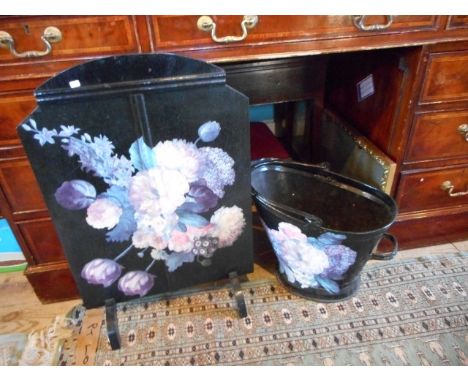 A 1920's fire screen, later painted with spring flowers on a black ground, together with a similar coal bucket, footstool, pi