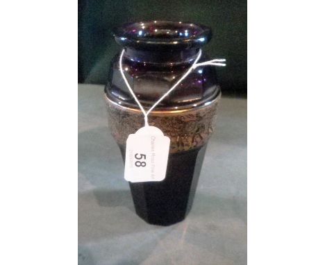 A Moser amethyst coloured glass vase, the ten sided body applied with a gilt metal band of classical soldiers, incised mark t