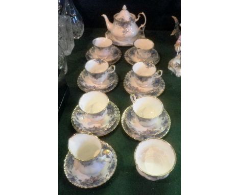 A Royal Albert Moonlight Rose tea service, a six place setting, comprising cups, saucers and tea plates, cream, sugar, teapot