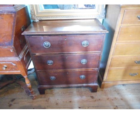 A mid-19th century mahogany chest, having rectangular top with moulded edge over three long drawers on bracket feet, 74cm wid