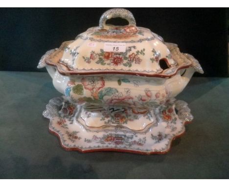 An Edwardian ironstone soup tureen, cover and stand by Ashworth Brothers, hand coloured transfer decorated with flowering urn