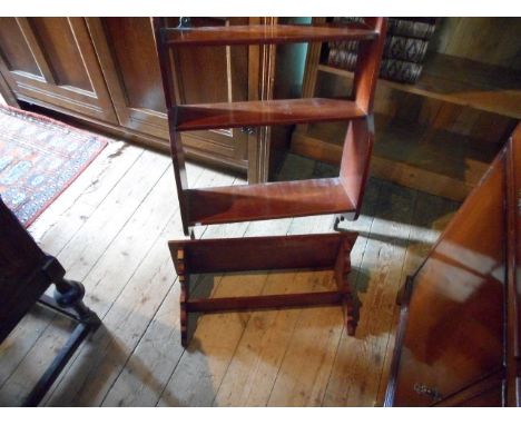 A set of mahogany three tier open wall hanging shelves, together with a similar single bracket shelf.