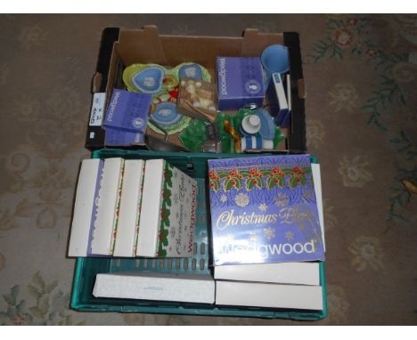 Two boxes containing Wedgwood Christmas plates, a pair of Cornishware condiments, a Carltonware lobster dish, kitchenalia and