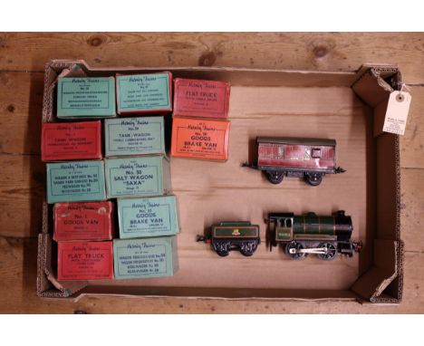 Hornby O gauge railway. A Type 51 BR clockwork tender locomotive 50153 in lined green. Plus 13 freight wagons including 2x ta