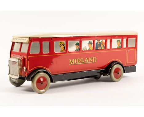 A scarce Chad Valley tinplate clockwork single deck bus. (10005). An example finished in red and cream 'Midland' livery, red 