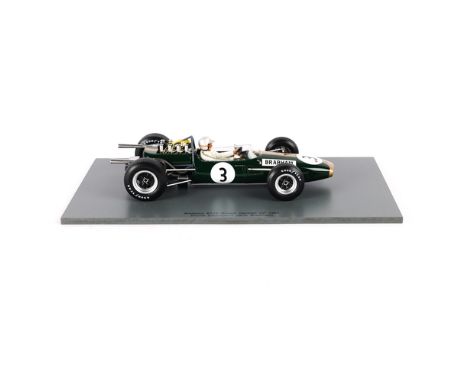 A 1:18 scale Spark Brabham BT19. Jack Brabham World Champion 1966. Mounted on a plinth. Boxed with internal packing. Vehicle 