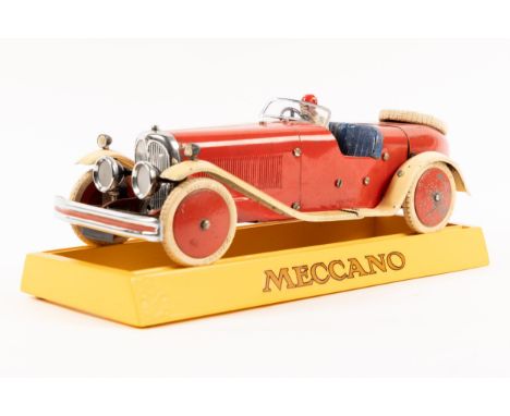 A rare 1930's No.2 Meccano Constructor Car. A round tail example in red with cream mudguards and running boards, blue seat, r