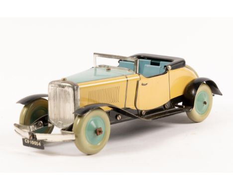 A Chad Valley tinplate clockwork open topped 4 seat Ubilda Series tourer. Finished in light blue and cream with black tonneau