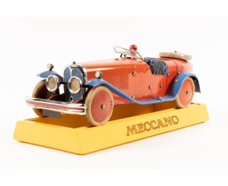 A rare 1930's No.2 Meccano Constructor Car. A boat tail example in red with blue mudguards and running boards, blue seat, red