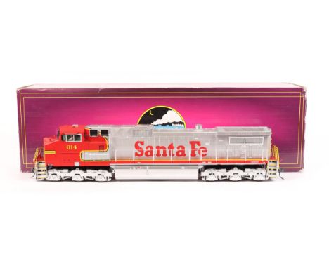 An M.T.H. Electric Trains 3-rail O gauge American outline DASH-9 Diesel Locomotive. An impressive North American twin bogied 