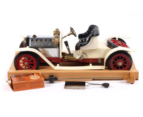 A MAMOD Steam Roadster. In cream and red livery. Contents look complete and possibly unused, with all packing, paperwork and 