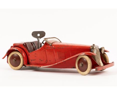 A scarce 1930's No.1 Meccano Constructor Car. An example made as a 2 seater sports car, In red with maroon seats, mudguards, 