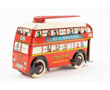 A 1950's Brimtoy tinplate clockwork 'Transport Bus' Trolley Bus. A larger scale example (21cm) in red with a cream roof, twin