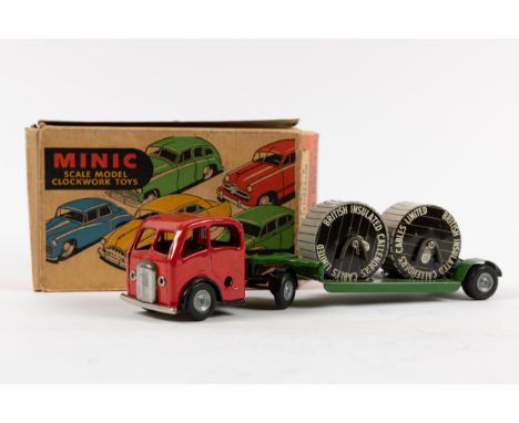 A Tri-ang Minic Mechanical Horse &amp; cable trailer. Red tractor unit with green trailer carrying 2 cable reels. Boxed, with