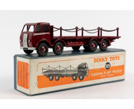 A rare Dinky Supertoys Foden Flat Truck with chains (505). In maroon with silver flash to cab, maroon wheels with black tyres