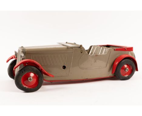 An extremley rare 1937 Lines Bros Tri-ang Series M.T.4. tinplate Magic Sports Car. Impressively large being 40cm in overall l