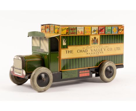 A Chad Valley DENNIS tinplate clockwork box van. In the livery of The Chad Valley Co Ltd, decorated on the roof and top of si