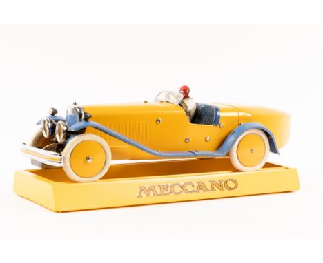 A rare 1930's No.2 Meccano Constructor Car. A boat tail example in bright yellow with blue mudguards and running boards, blue