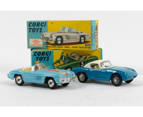 2 Corgi Toys.  Lotus Elan Coupe (319). An example in mid blue with white roof and interior, with detachable chassis and the l