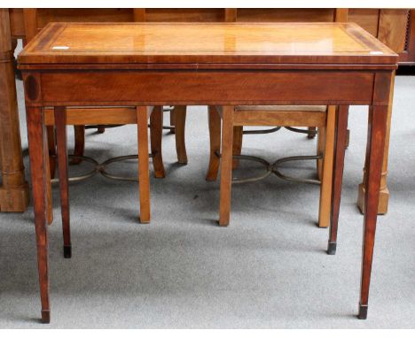 A George III Crossbanded and Inlaid Satinwood Foldover Card Table, on slender tapering square section supports, 92cm by 46cm 