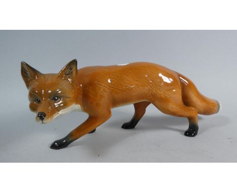 A Ceramic Study of a Fox, 27cm Long 