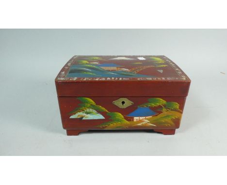 A Japanese Lacquered and Cantilevered Musical Jewellery Box with Key, Painted and Mother of Pearl Applied Decoration, 21cm Wi