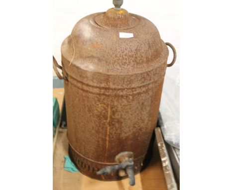 A VINTAGE CAST URN TOGETHER WITH A PADDLE 