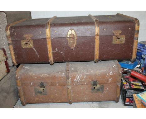 TWO VINTAGE BOUND TRAVEL TRUNKS