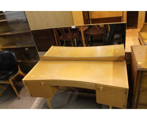 A QUANTITY OF LIGHT OAK BEDROOM FURNITURE CONSISTING OF A MATCHED DRESSING TABLE AND CHEST OF DRAWERS, TOGETHER WITH A SIMILA