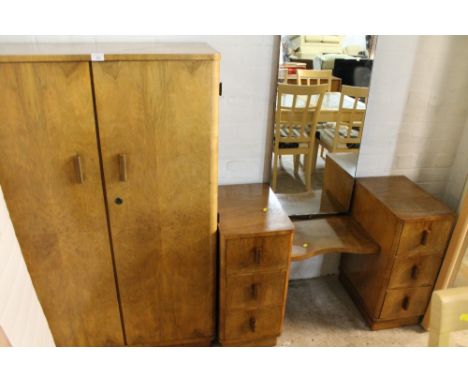 A SMALL LIGHT OAK WARDROBE TOGETHER WITH A DRESSING TABLE 