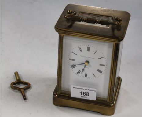 A SWISS MADE CARRIAGE CLOCK BY MATHEW NORMAN, LONDON (WITH KEY)