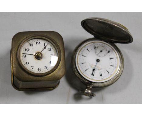 A SILVER POCKET WATCH WITH FRENCH AND BRITISH HALLMARKS, TOGETHER WITH A SMALL CONTINENTAL CARRIAGE CLOCK 