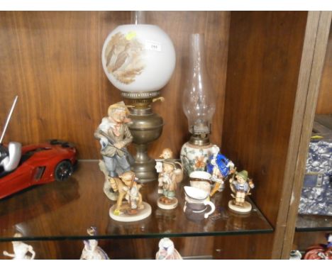 A PARAFFIN LAMP, GOEBEL FIGURES ETC