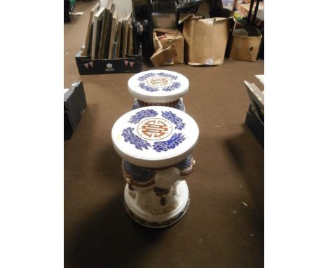 A PAIR OF CERAMIC ELEPHANT STOOLS
