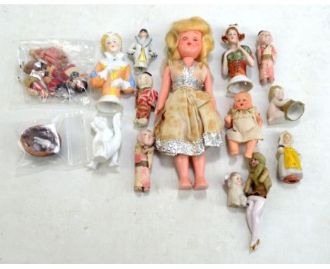 A Roddy fairy doll, three ceramic half dolls and further small dolls and figures.