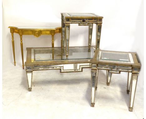 A glass top coffee table with mirrored panels and two matching side tables, also a French-style console table with mirrored t