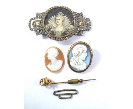 A Victorian yellow metal framed oval cameo brooch depicting the bust of Bacchus, 3.5 x 3cm, a further later loose cameo, a 19