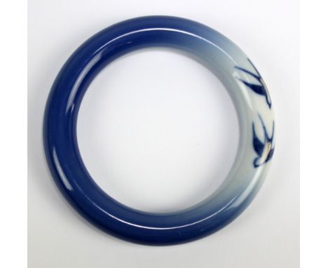ROYAL COPENHAGEN; a boxed porcelain&nbsp;bangle decorated with two birds, diameter 8.5cm.Additional InformationAppears good w