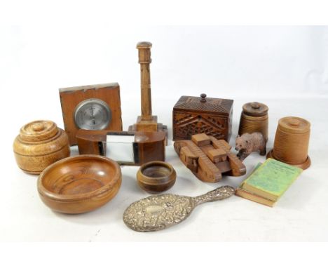 A group of treen to include an oak tea caddy engraved '1854' to the lid, a commemorative obelisk dated 1832, a model of a tan
