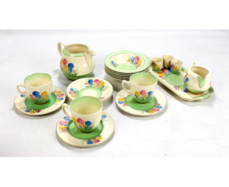 CLARICE CLIFF; a group of Royal Staffordshire 'Spring' and 'Crocus' pattern decorated tea ware comprising three cups, two sau
