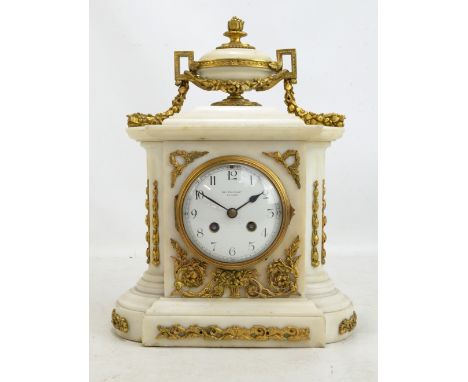 A 19th century French alabaster and gilt metal detailed eight days mantel clock, the circular enamel dial set with Arabic num