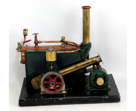 A scratch built steam driven stationary engine with Stuart dial, width 33cm (af).Additional InformationWe would be unable to 
