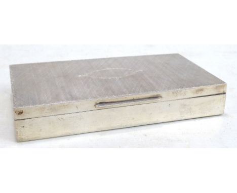 EZIO UGOLINI; a mid-20th century Italian silver rectangular cigarette box with fine engine turned decorated hinged lid enclos