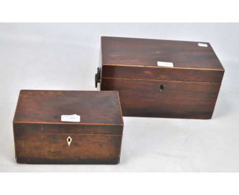 A Regency mahogany and line inlaid twin handled tea caddy, with fitted interior (lacking bowl), width 30cm and a smaller two-