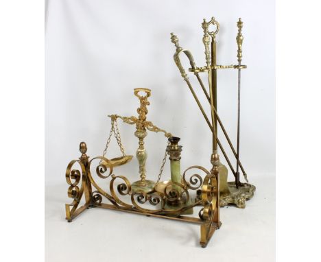 A brass companion set, fire front, pair of glass and onyx scales and similar single candlestick.&nbsp;
