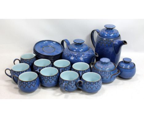 DENBY; a 'Midnight' pattern eight setting tea service comprising cups and saucers, a teapot, a coffee pot, a cream jug, a sug